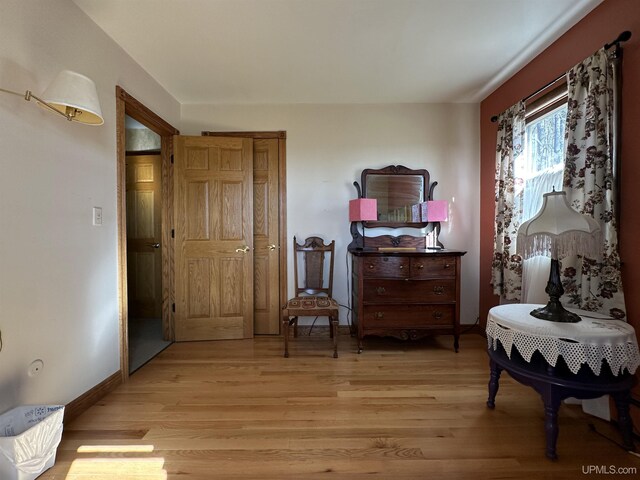 9014 Stagecoach Q.5 Ave, Gladstone, MI 49837 - sitting room featuring light wood-style flooring and baseboards