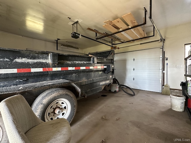9014 Stagecoach Q.5 Ave, Gladstone, MI 49837 - garage featuring a garage door opener