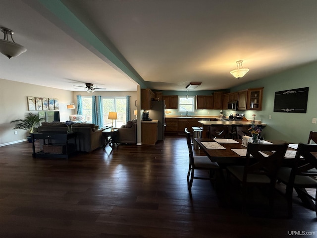 1300 W Sharon Ave, Houghton, MI 49931 - dining area with dark wood-style floors and ceiling fan