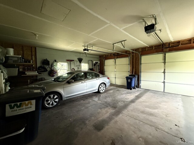 1300 W Sharon Ave, Houghton, MI 49931 - garage with a garage door opener