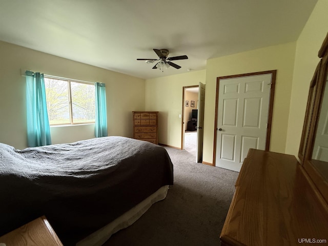 1300 W Sharon Ave, Houghton, MI 49931 - carpeted bedroom featuring a ceiling fan