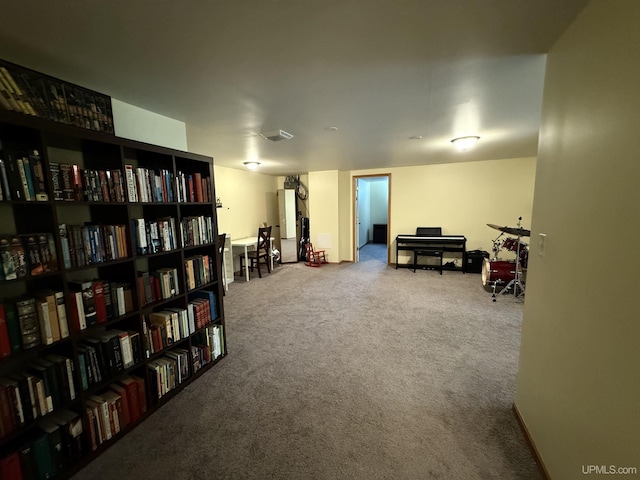 1300 W Sharon Ave, Houghton, MI 49931 - living area featuring carpet flooring and bookshelves
