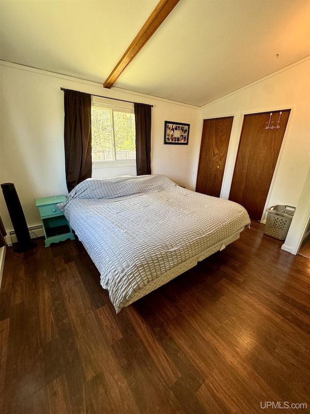 900 Wabash St, Ishpeming, MI 49849 - bedroom with wood finished floors and multiple closets