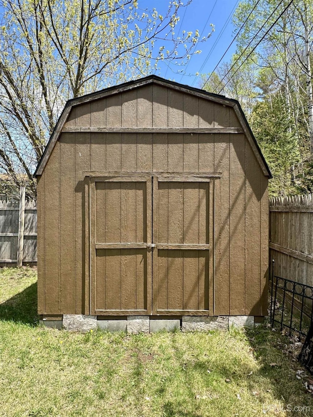 900 Wabash St, Ishpeming, MI 49849 - view of shed with a fenced backyard