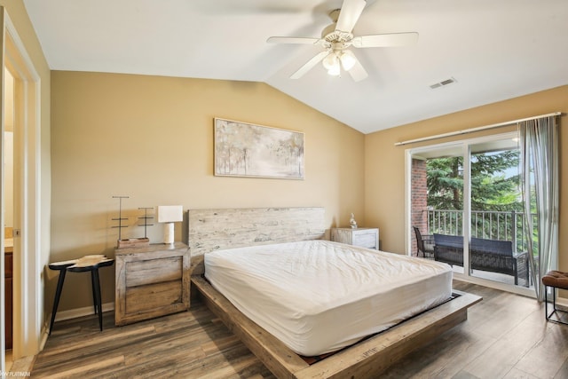 bedroom with access to outside, lofted ceiling, wood finished floors, and a ceiling fan