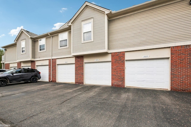 view of home's exterior featuring brick siding