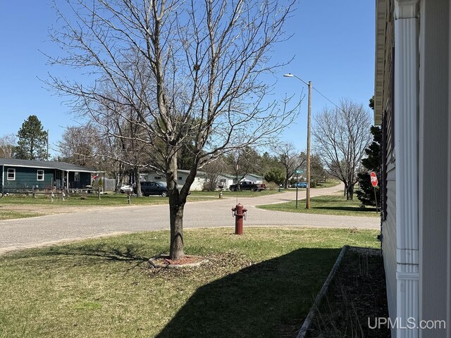 99 N Mitchell St, Gwinn, MI 49841 - view of green lawn