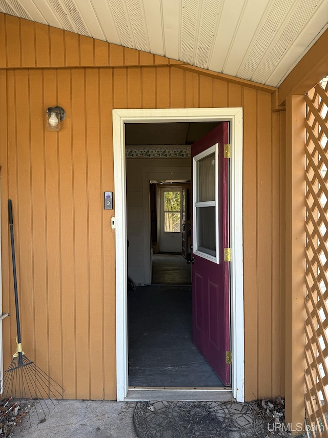 99 N Mitchell St, Gwinn, MI 49841 - view of exterior entry with board and batten siding