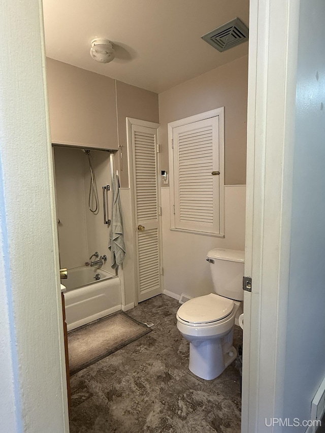 99 N Mitchell St, Gwinn, MI 49841 - full bathroom featuring toilet,  shower combination, and baseboards