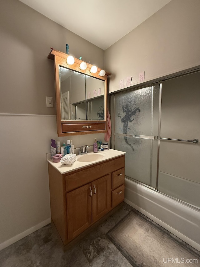 99 N Mitchell St, Gwinn, MI 49841 - full bath with vanity, shower / bath combination with glass door, and baseboards
