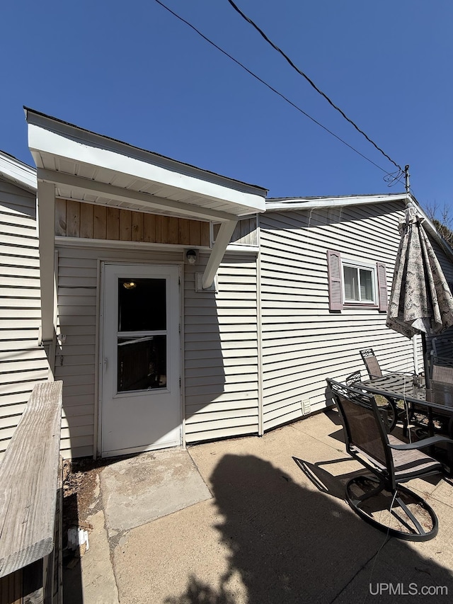 99 N Mitchell St, Gwinn, MI 49841 - entrance to property with a patio