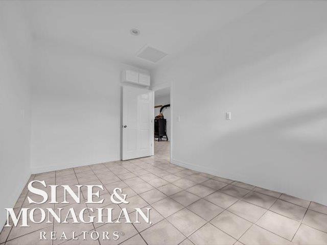view of tiled spare room