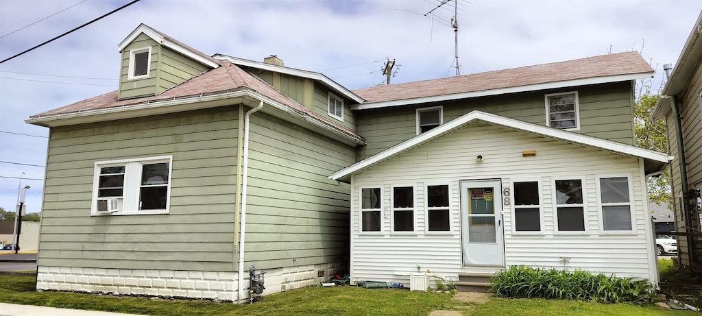 68 13th St, Port Huron, MI 48060 - back of house featuring entry steps, a chimney, and a shingled roof