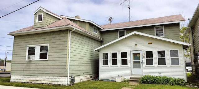 68 13th St, Port Huron, MI 48060 - back of house featuring entry steps, a chimney, and a shingled roof