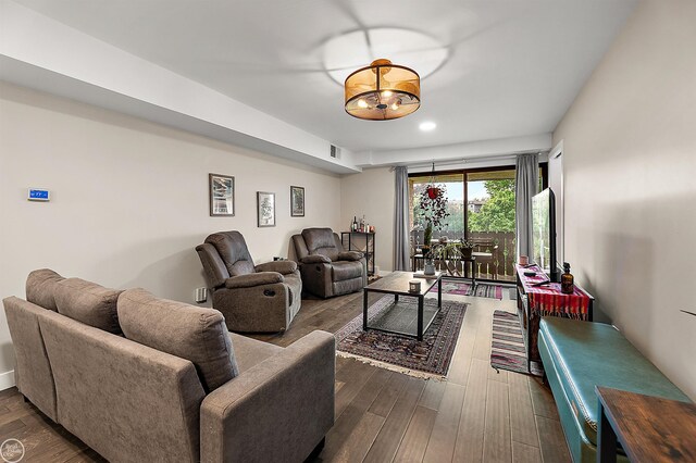 2102 Pauline Blvd Unit 304, Ann Arbor, MI 48103 - living area with dark wood-type flooring and recessed lighting