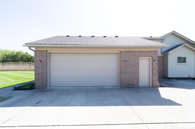 garage featuring driveway