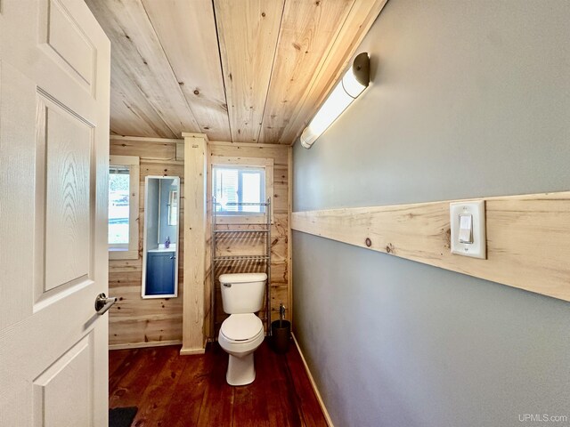 518 Lynn St, Munising, MI 49862 - half bathroom featuring wood ceiling, wood finished floors, and toilet