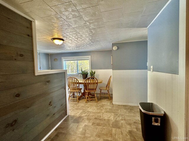 518 Lynn St, Munising, MI 49862 - hall with wood walls and wainscoting
