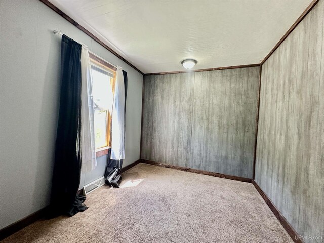 518 Lynn St, Munising, MI 49862 - unfurnished room with carpet floors and baseboards