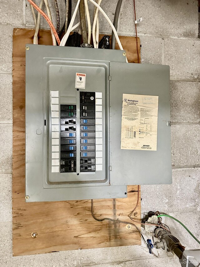 518 Lynn St, Munising, MI 49862 - utility room featuring electric panel