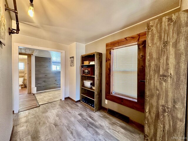 518 Lynn St, Munising, MI 49862 - foyer entrance with wood finished floors and baseboards