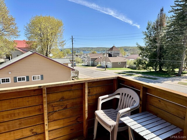 518 Lynn St, Munising, MI 49862 - view of yard with a balcony and a residential view