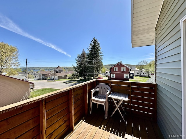 518 Lynn St, Munising, MI 49862 - wooden terrace with a residential view
