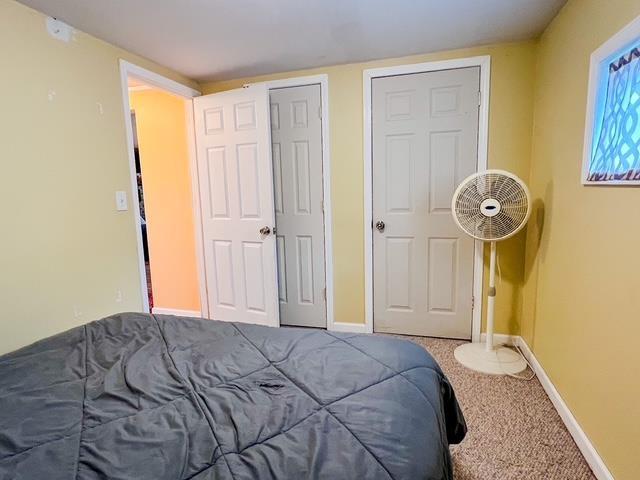 601 N Scott Dr, Farwell, MI 48622 - carpeted bedroom featuring baseboards