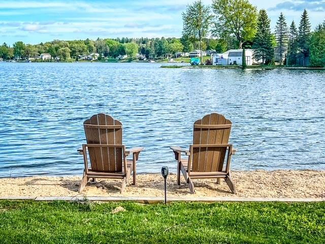 601 N Scott Dr, Farwell, MI 48622 - dock featuring a water view