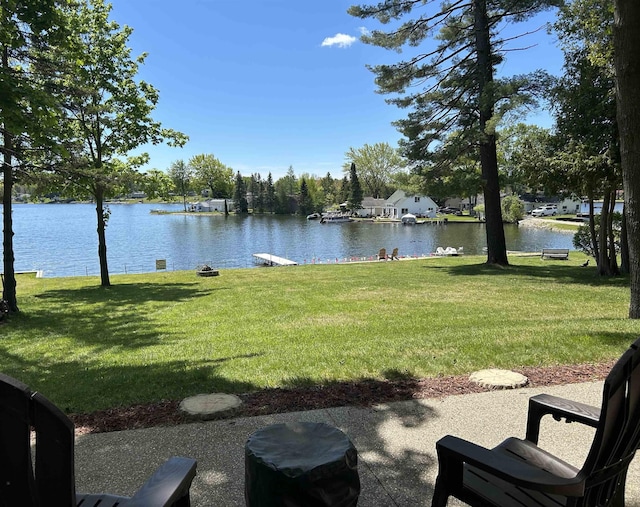 601 N Scott Dr, Farwell, MI 48622 - view of green lawn featuring a water view