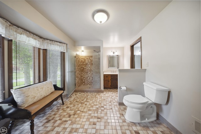 53638 Sherwood Ln, Shelby Twp, MI 48315 - full bathroom featuring a stall shower, toilet, baseboards, and vanity