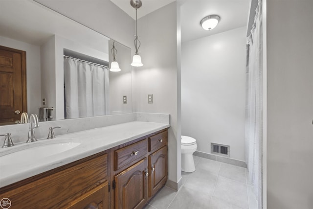 53638 Sherwood Ln, Shelby Twp, MI 48315 - full bathroom featuring toilet, vanity, tile patterned floors, and baseboards