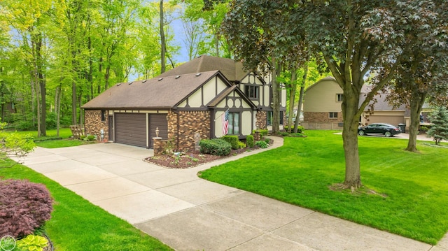 53638 Sherwood Ln, Shelby Twp, MI 48315 - tudor-style house featuring concrete driveway, an attached garage, a front yard, brick siding, and a shingled roof