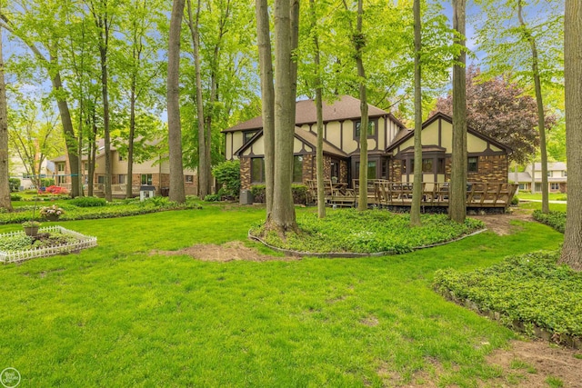 53638 Sherwood Ln, Shelby Twp, MI 48315 - view of green lawn with a deck