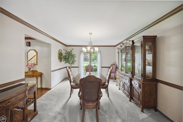 53638 Sherwood Ln, Shelby Twp, MI 48315 - dining space featuring a chandelier, crown molding, and baseboards