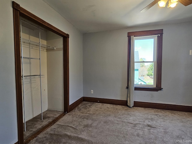 120 N Pewabic St, Laurium, MI 49913 - unfurnished bedroom with carpet floors, ceiling fan, a closet, and baseboards
