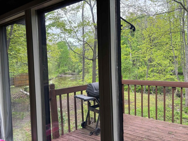 2913 W Howard Rd, Beaverton, MI 48612 - wooden deck featuring a water view and a view of trees