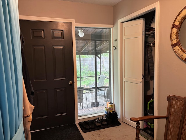 2913 W Howard Rd, Beaverton, MI 48612 - entryway featuring wood finished floors