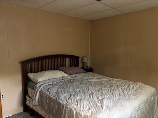 2913 W Howard Rd, Beaverton, MI 48612 - carpeted bedroom featuring a drop ceiling