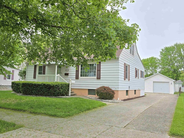 408 Sidney St, Bay City, MI 48706 - view of property hidden behind natural elements featuring an outdoor structure, a garage, concrete driveway, and a front lawn