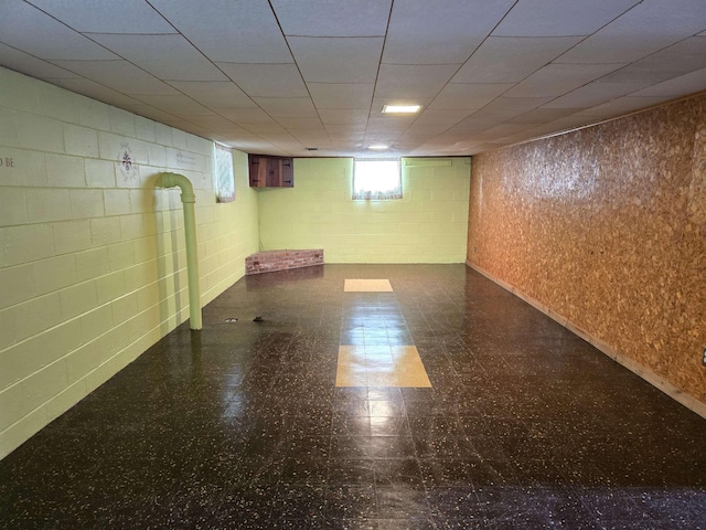 408 Sidney St, Bay City, MI 48706 - below grade area featuring tile patterned floors and concrete block wall