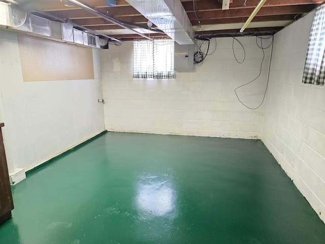 408 Sidney St, Bay City, MI 48706 - below grade area featuring electric panel and concrete block wall