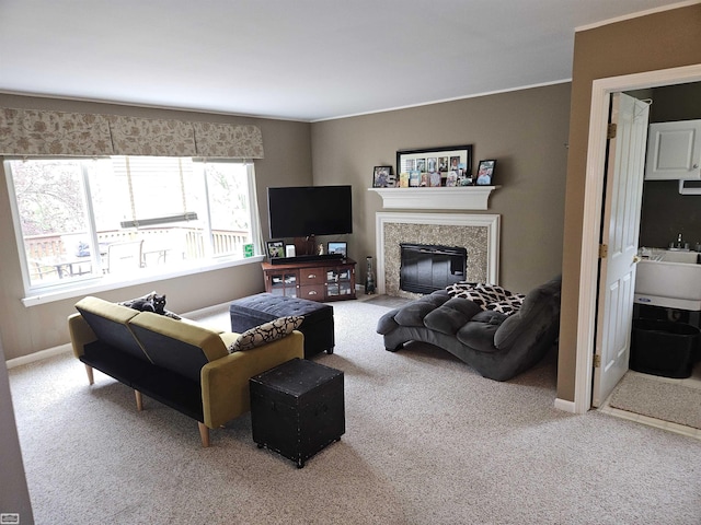 4324 Clear Creek Ct, Oakland Twp, MI 48306 - carpeted living area with a tiled fireplace and baseboards