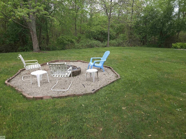 4324 Clear Creek Ct, Oakland Twp, MI 48306 - view of green lawn featuring a fire pit