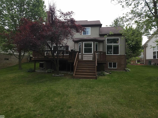 4324 Clear Creek Ct, Oakland Twp, MI 48306 - rear view of property with stairs, a wooden deck, a yard, and brick siding