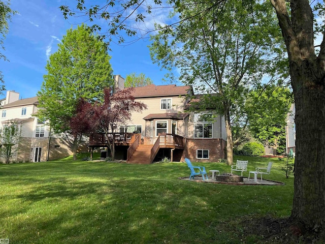 4324 Clear Creek Ct, Oakland Twp, MI 48306 - rear view of house featuring stairs, a deck, and a yard