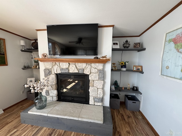 93 E Johnson Lake Rd, Gwinn, MI 49841 - living room featuring crown molding, wood finished floors, a fireplace, baseboards, and ceiling fan