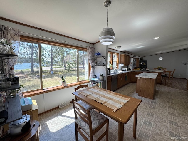 93 E Johnson Lake Rd, Gwinn, MI 49841 - dining room with vaulted ceiling, baseboards, and ornamental molding