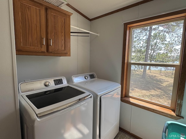 93 E Johnson Lake Rd, Gwinn, MI 49841 - laundry room with separate washer and dryer, crown molding, and cabinet space