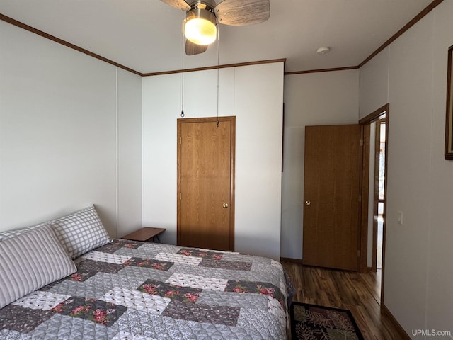 93 E Johnson Lake Rd, Gwinn, MI 49841 - bedroom with wood finished floors, crown molding, and ceiling fan